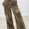 She's A Survivor Mid Rise Distressed Jeans